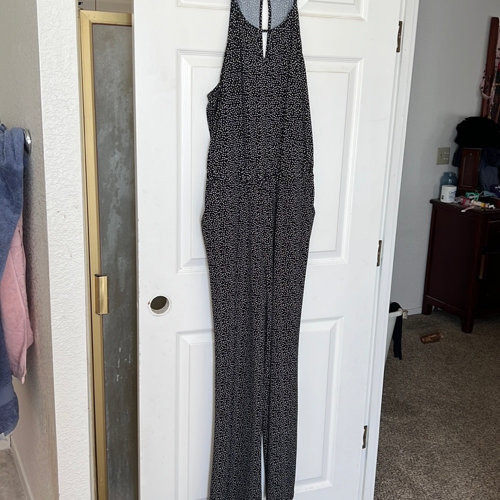 Black with white dots jumpsuit worn once great condition